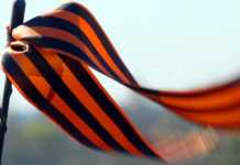 Близько третини українців не підтримують заборону “георгіївської стрічки” – опитування